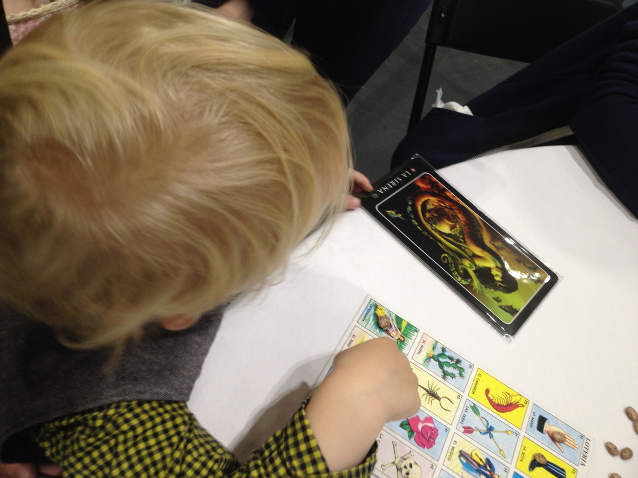 At the Loteria demo on Sunday morning: this kid won one of the awesome prizes—a pack of six "grande" Loteria cards!